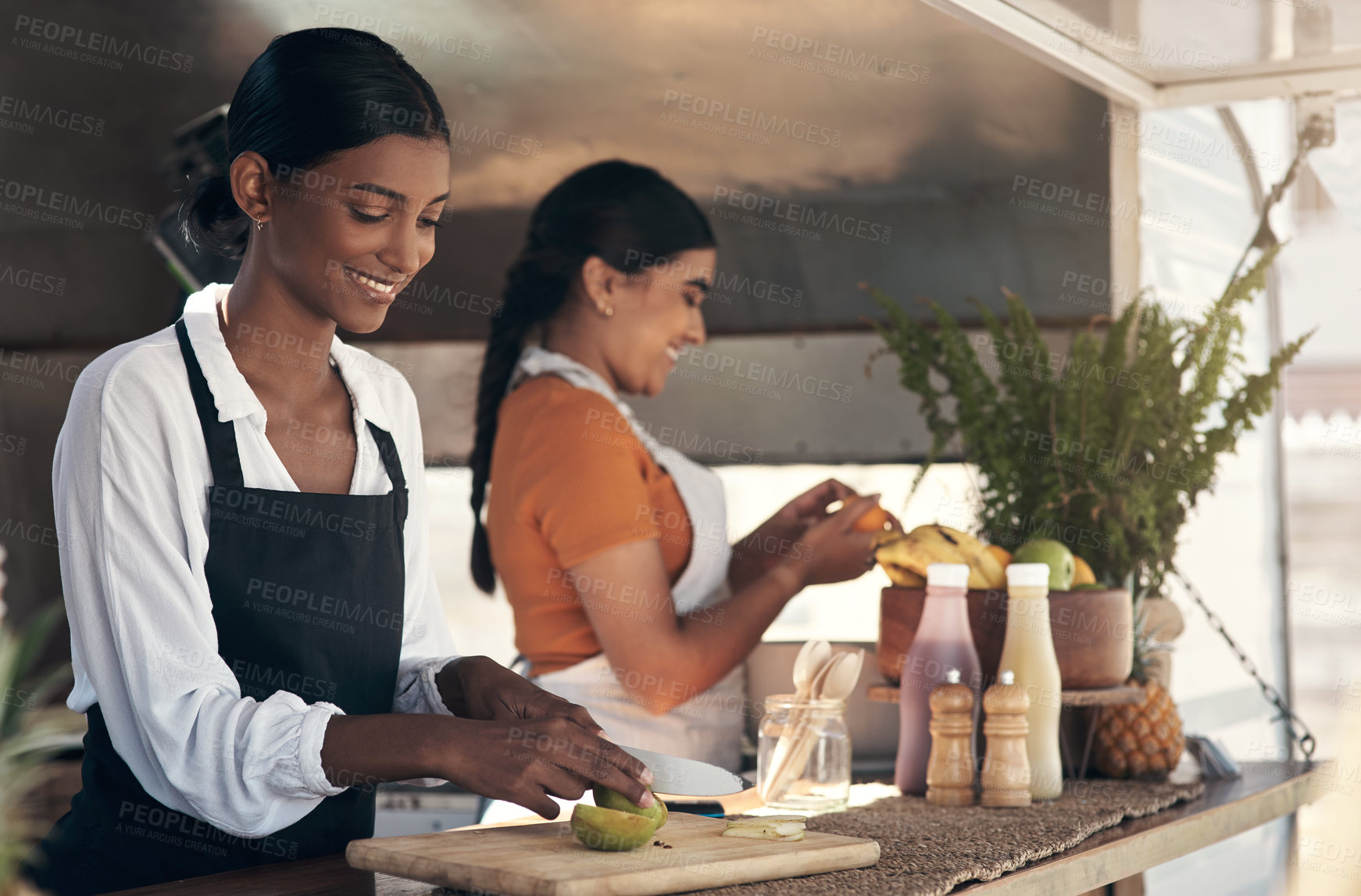 Buy stock photo Shot of two a businessman planning for the day with his staff