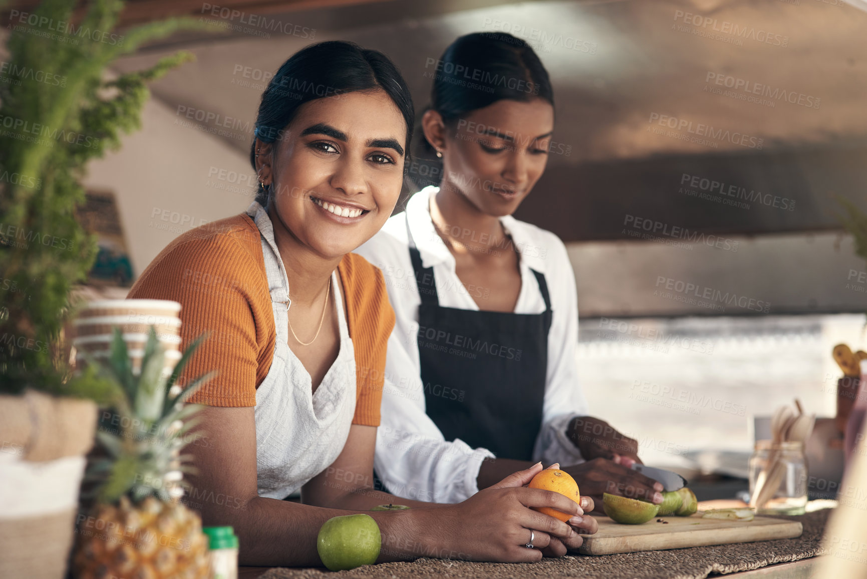 Buy stock photo Shot of two a businessman planning for the day with his staff