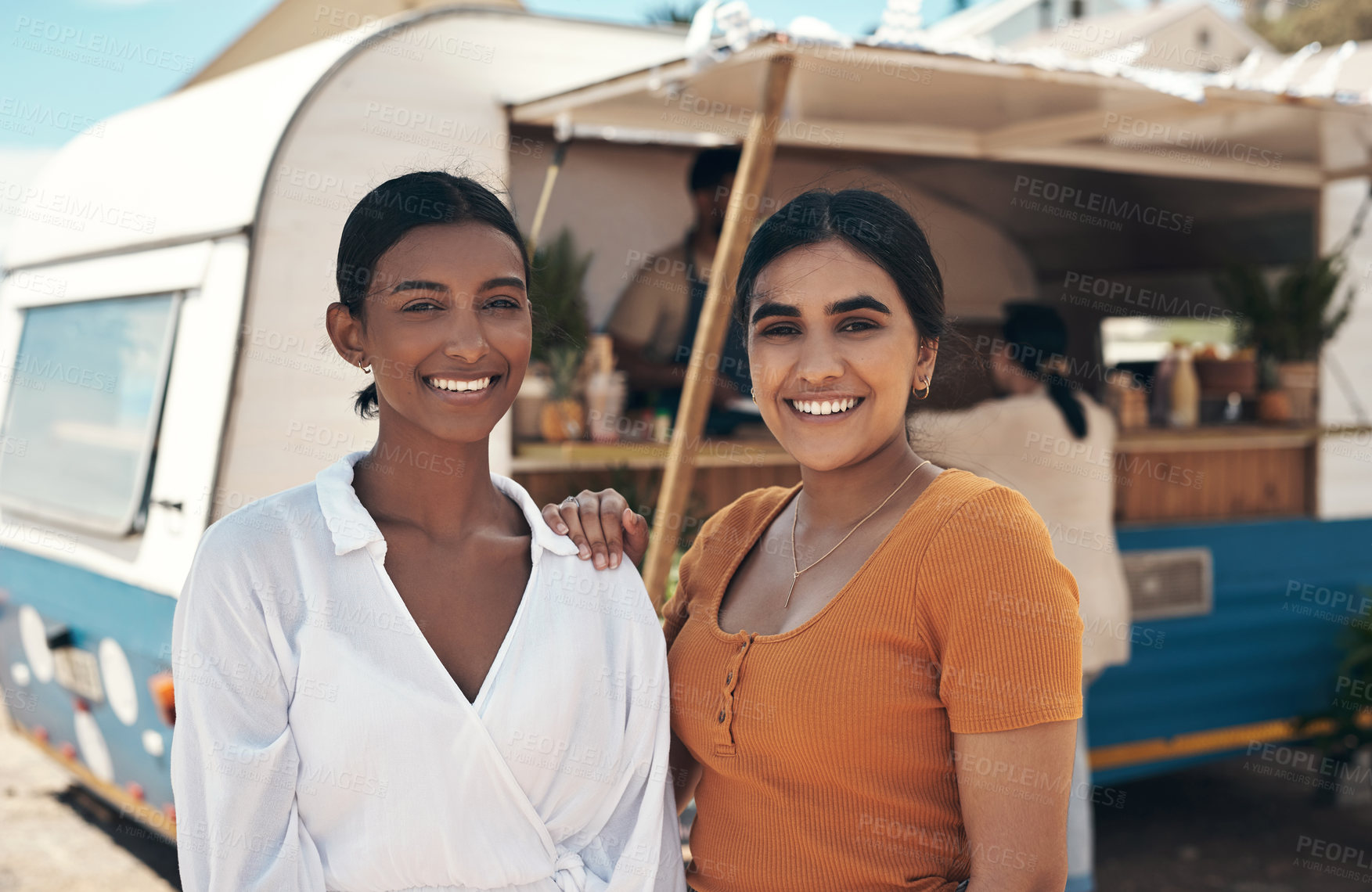 Buy stock photo Shot of two friends spending the day together