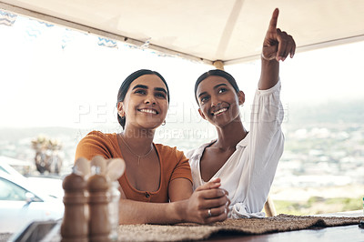 Buy stock photo Shot of two friends ordering food
