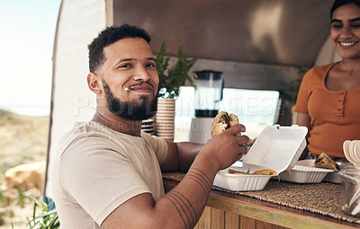 Buy stock photo Shot of a man eating his food