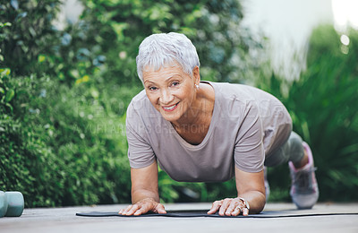 Buy stock photo Portrait of an older woman in an impressive planking position outside