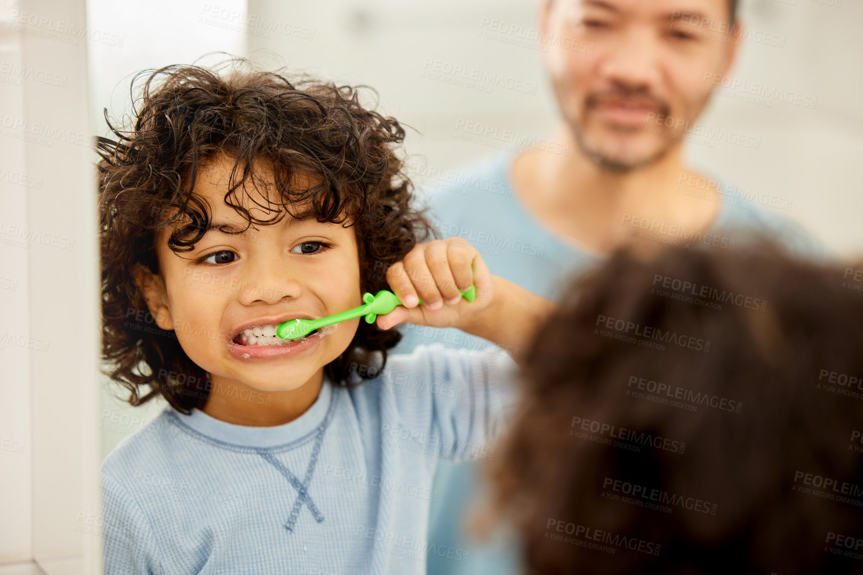 Buy stock photo Face, mirror and child brushing teeth in a family home bathroom for health and wellness. Reflection of a latino boy kid with his father to learn about dental, oral and mouth care with a toothbrush