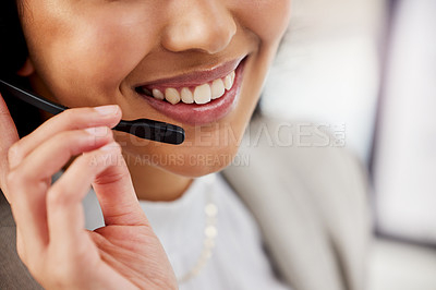 Buy stock photo Closeup shot of an unrecognisable businesswoman wearing a headset while working in an office