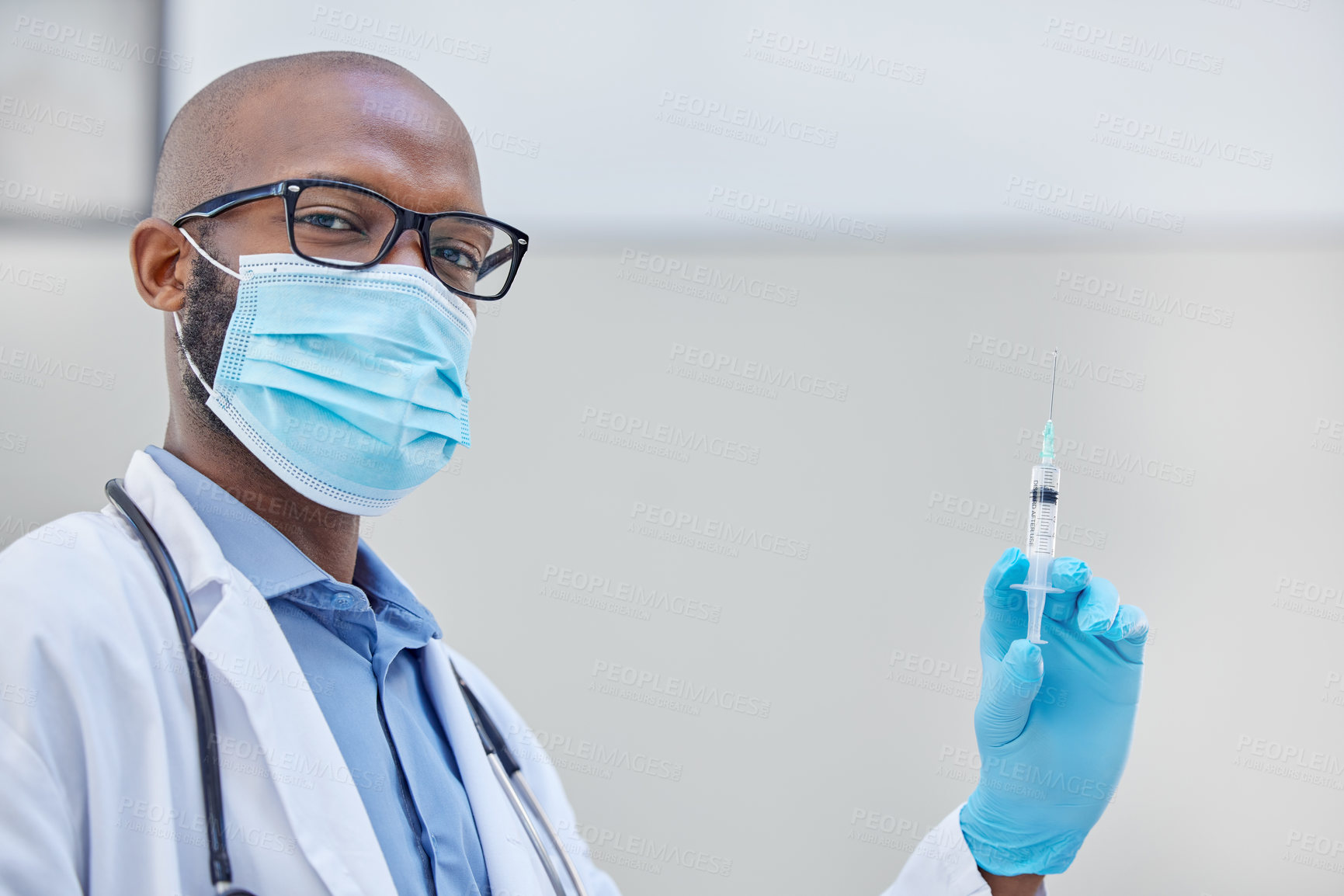 Buy stock photo Portrait, black man and syringe for medical research, injection and medicine or cure. Hospital, clinic or futuristic science for life extension drugs, health care and pathology or pharmaceutical test