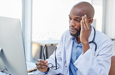 Buy stock photo Stress, black man and doctor with a headache, frustrated or burnout with a computer error, glitch or health issue. Male person, employee or medical professional with a migraine, technology or anxiety