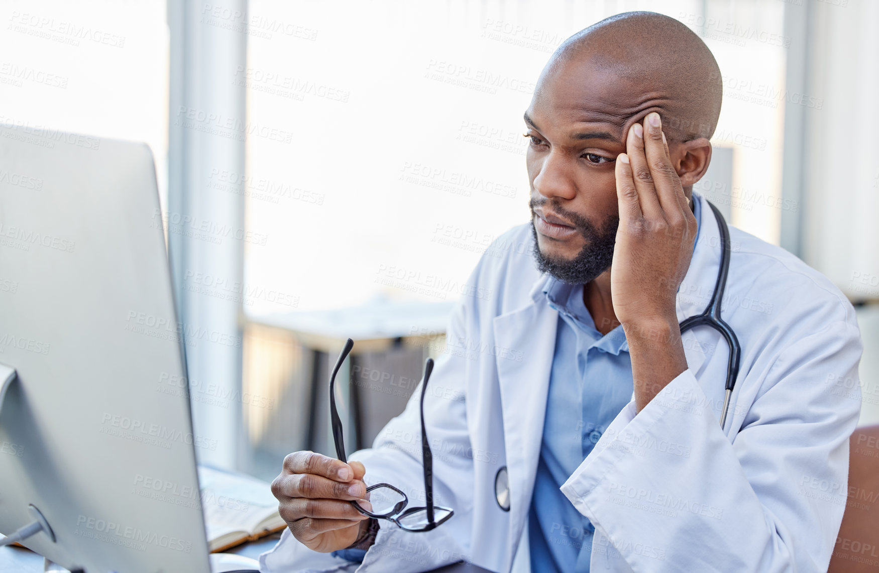 Buy stock photo Stress, black man and doctor with a headache, frustrated or burnout with a computer error, glitch or health issue. Male person, employee or medical professional with a migraine, technology or anxiety