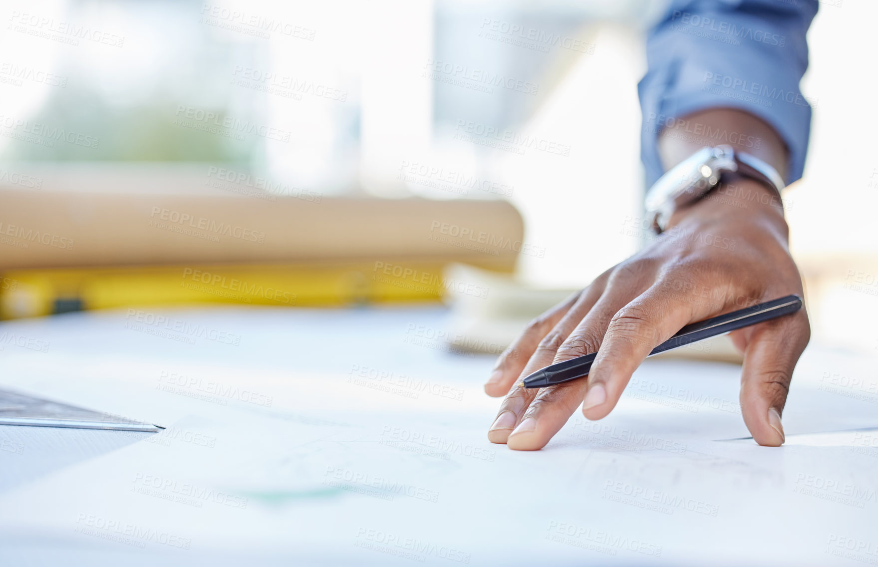 Buy stock photo Cropped shot of an unrecognisable businessman busy with paperwork