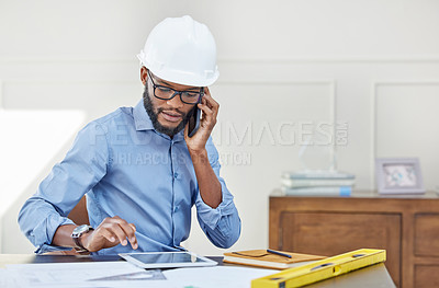 Buy stock photo Planning, man architect with smartphone and tablet at his desk in his workplace office. Architecture, industrial and male construction worker on a cellphone on a call at his workspace with ppe