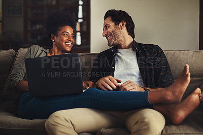 Buy stock photo Laptop, relax and an interracial couple streaming a movie using an online subscription service for entertainment. Computer, watching or internet with a man and woman bonding together over a video