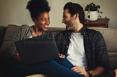 Buy stock photo Laptop, entertainment and interracial with a couple streaming a movie using an online subscription service to relax. Computer, watching or internet with a man and woman bonding together over a film