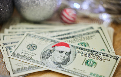 Buy stock photo Shot of money on a table during Christmas time