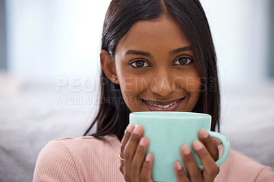 Buy stock photo Indian woman, portrait and coffee in house for relax, happiness and drink in morning for routine or wake up. Female person, gen z and sofa in apartment for self care, break and weekend with smile
