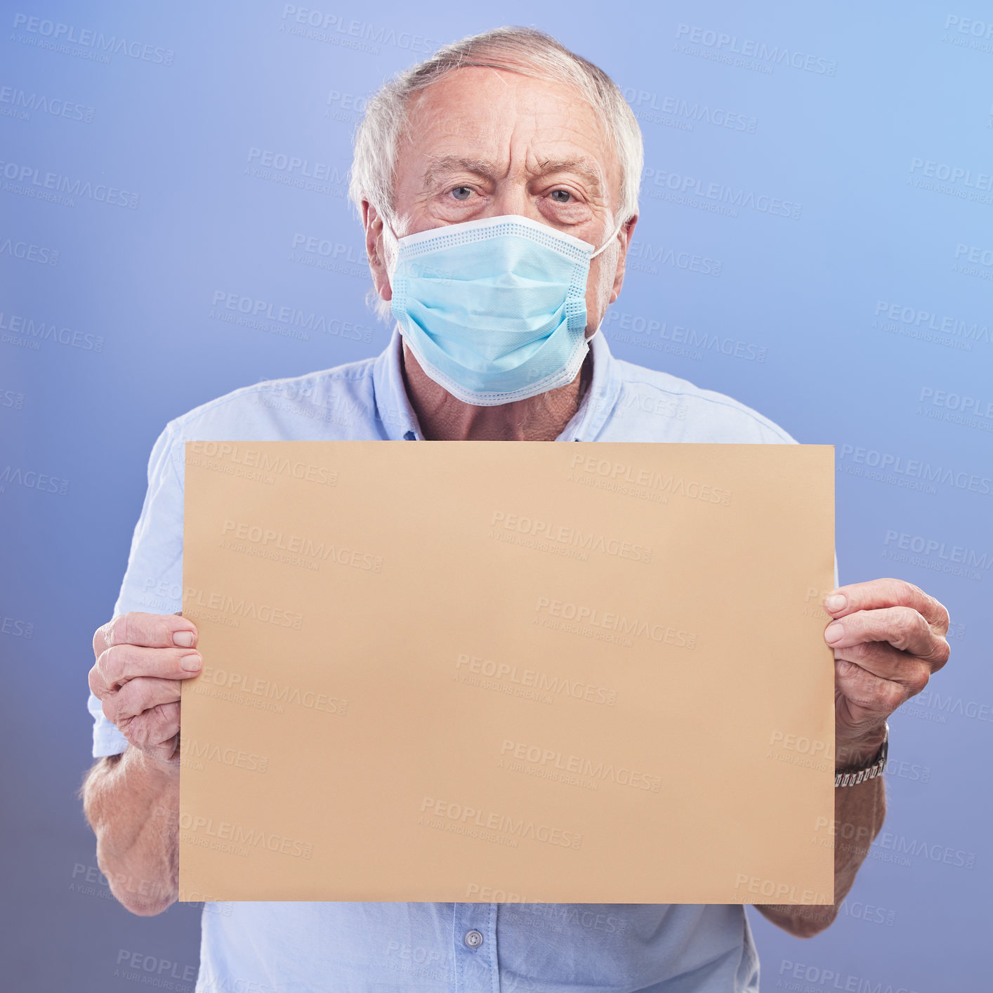 Buy stock photo Health, face mask and portrait of senior man with poster in studio for awareness, healthcare or vaccination on blue background. Mockup, cardboard sign and elderly person for advice, covid or wellness