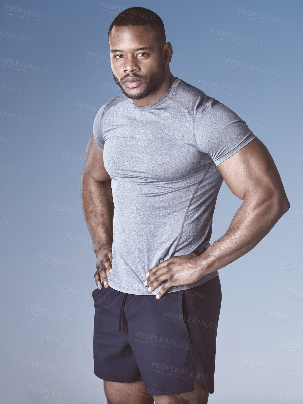 Buy stock photo Black man, portrait and confident for fitness in studio, wellness and strong on blue background. Male person, athlete and proud bodybuilder for training, exercise and ready for workout challenge