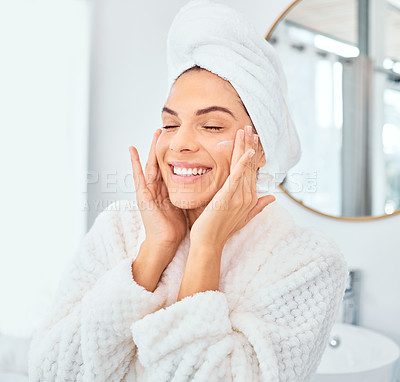 Buy stock photo Skincare, smile and woman with face cream in a bathroom for wellness, dermatology and treatment in her home. Facial, lotion and happy female person with sunscreen, cosmetic and collagen beauty cream