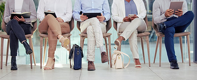 Buy stock photo Business people, waiting room chair and interview with phone, tablet and notebook for info, research or preparation. Men, women and technology for reading, job opportunity or recruitment at hr agency