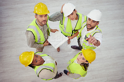 Buy stock photo Architect, portrait and team with documents for planning, meeting or construction above at workplace. Top view or group of people, engineering or contractors with floor, paperwork or helmet on site