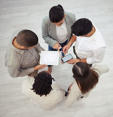 Buy stock photo Shot of a unrecognzable group of colleagues planning in a office