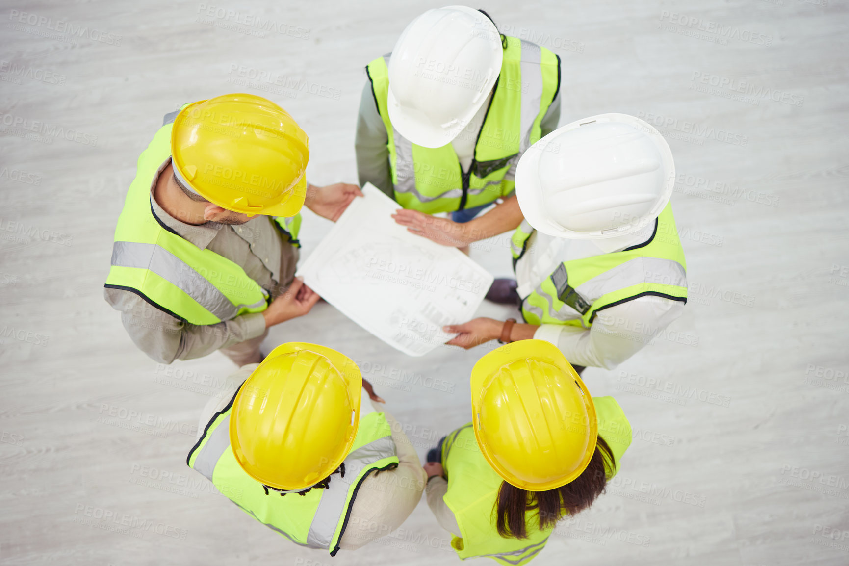 Buy stock photo Ariel shot of a group of unrecognizable colleges planning in a office