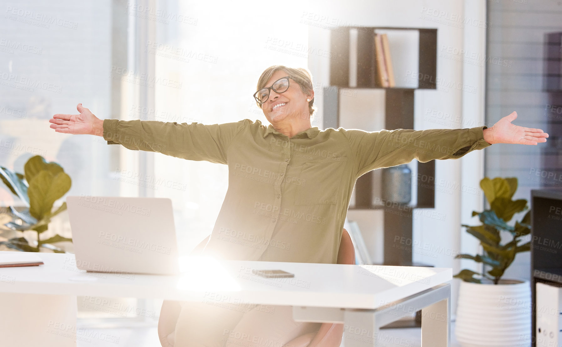 Buy stock photo Businesswoman, arms and success by stretched to celebrate freedom from finish project in office. Happy, female person and manager for winning with milestone for progress of goal growth at desk