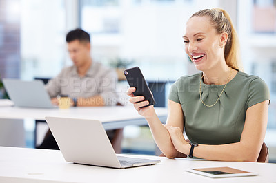 Buy stock photo Woman, laugh and smartphone in office with laptop, browse and communication for business people. Web, and internet search on tablet for information, company and online for funny meme on technology
