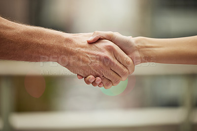 Buy stock photo Closeup shot of two unrecognisable people shaking hands
