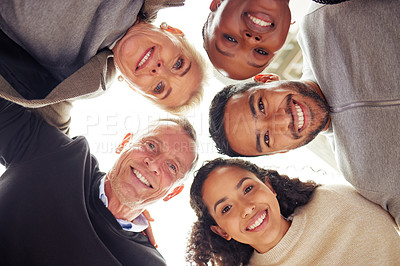 Buy stock photo Portrait of a group of businesspeople standing together in a huddle