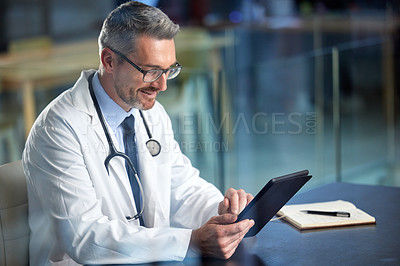 Buy stock photo Healthcare, doctor and man with a tablet, typing and connection with online reading, innovation and internet. Male person, employee and medical physician with technology, website info or professional