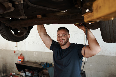 Buy stock photo Portrait, inspection and mechanic with car in workshop for service, maintenance or repair for safety. Smile, auto engineering and industrial worker checking bottom of vehicle for oil leak in garage.