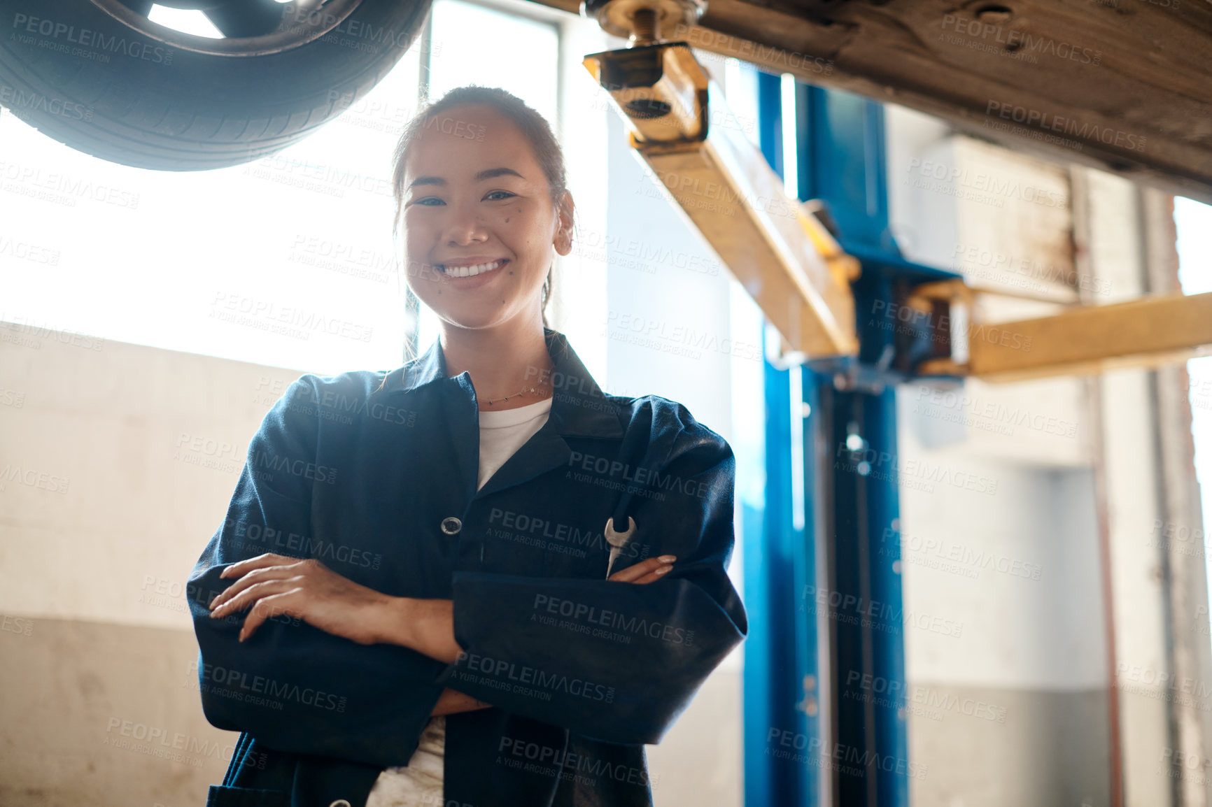 Buy stock photo Portrait, Asian woman and arms crossed as car mechanic in garage with pride for career growth. Workshop, empowerment and happy for startup or small business as engineer for repairs and service