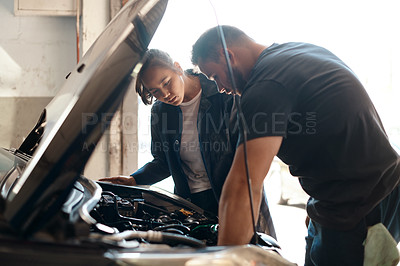 Buy stock photo People, mechanic and car engine with teamwork, conversation and inspection for maintenance. Employees, entrepreneur and coworkers with vehicle issue, industry and cooperation with solution in garage