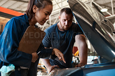 Buy stock photo Employees, car mechanic and clipboard in garage for inspection in teamwork, collaboration and maintenance. Partner, people and vehicle repairs or service as engineer with small business and workshop