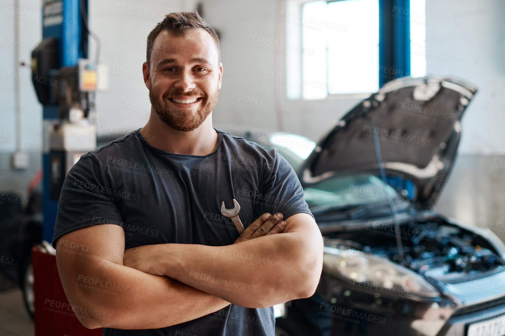 Buy stock photo Mechanic, man and arms crossed by car in garage for auto repair, service and smile in portrait. Engineer, person and small business for vehicle maintenance with tools, spanner or industry at workshop