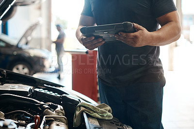 Buy stock photo Tablet, checklist and mechanic in workshop with car service, maintenance or online auto insurance. Tech, engine and man in garage with digital app for inspection, motor repair and quality assurance