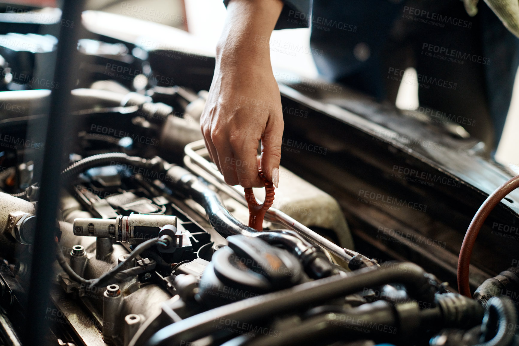 Buy stock photo Car, hand and mechanic with person in workshop for maintenance, repair or service of engine. Auto, expert and inspection with vehicle engineer or technician checking dipstick for oil level in garage