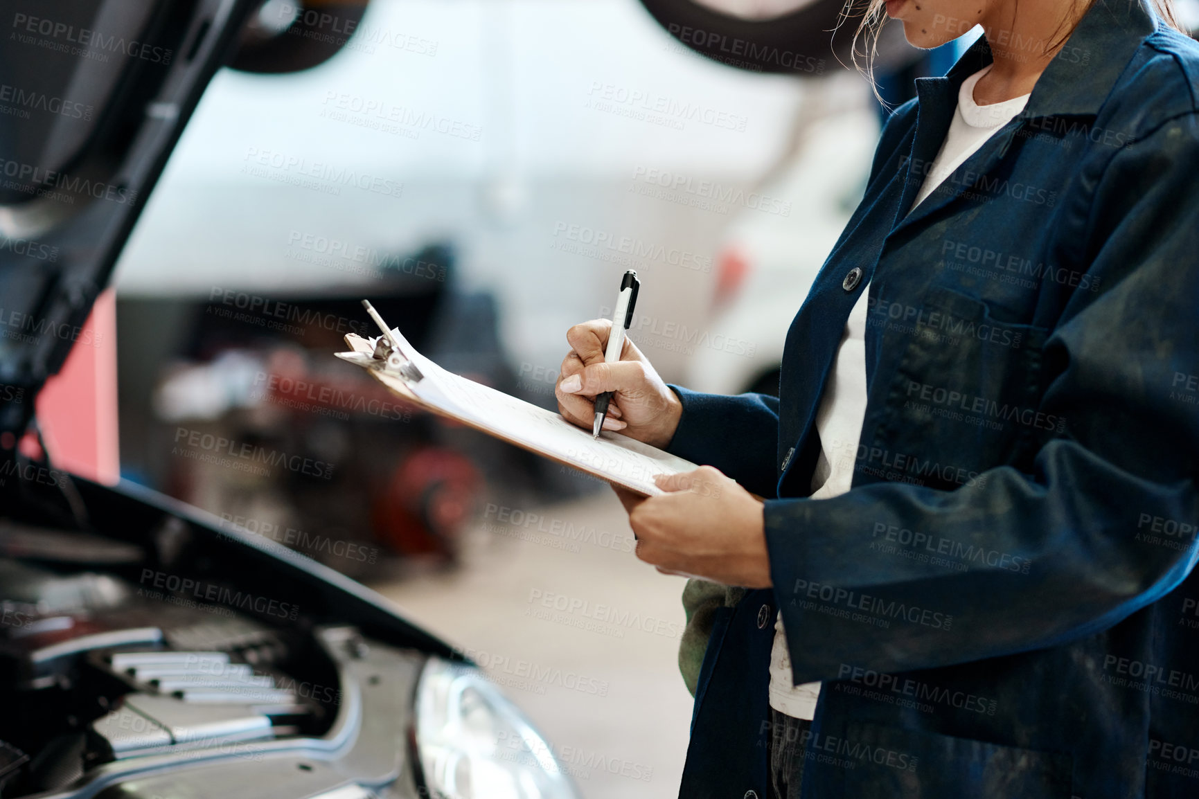 Buy stock photo Workshop, hands or car mechanic with clipboard for writing, maintenance and engine inspection. Repair shop, service and female person with checklist, auto experience and vehicle notes in garage