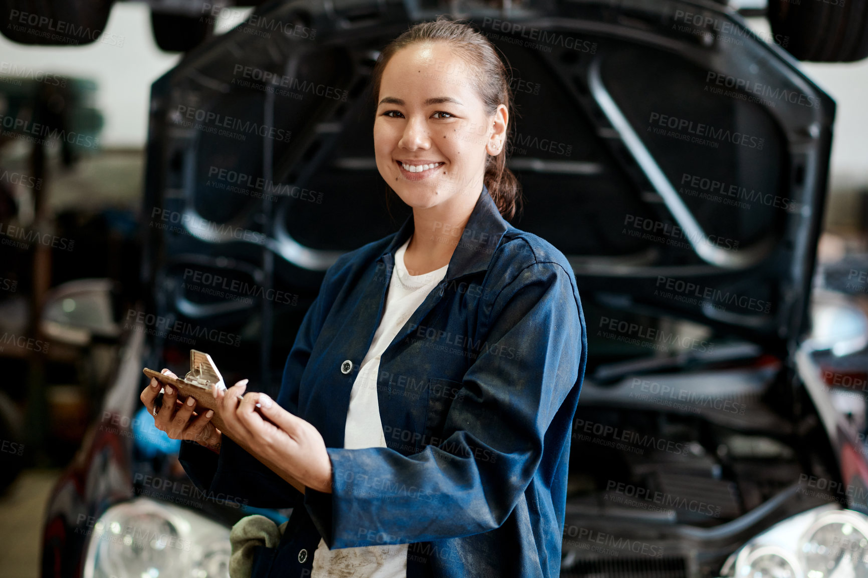 Buy stock photo Portrait, woman or car mechanic with clipboard for inspection, writing and engine maintenance in workshop. Repair shop, service and female expert with checklist, auto experience and notes in garage