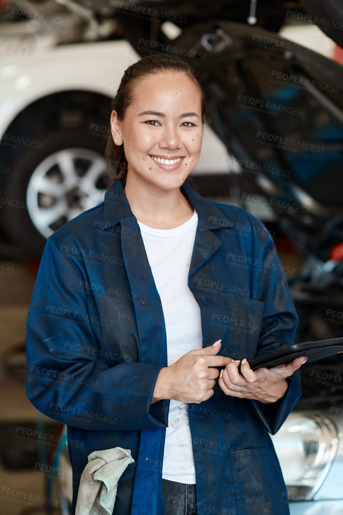 Buy stock photo Tablet, portrait and woman in garage with car service, maintenance or online motor insurance. Tech, engine and female mechanic in workshop on digital app for inspection, repair and quality assurance