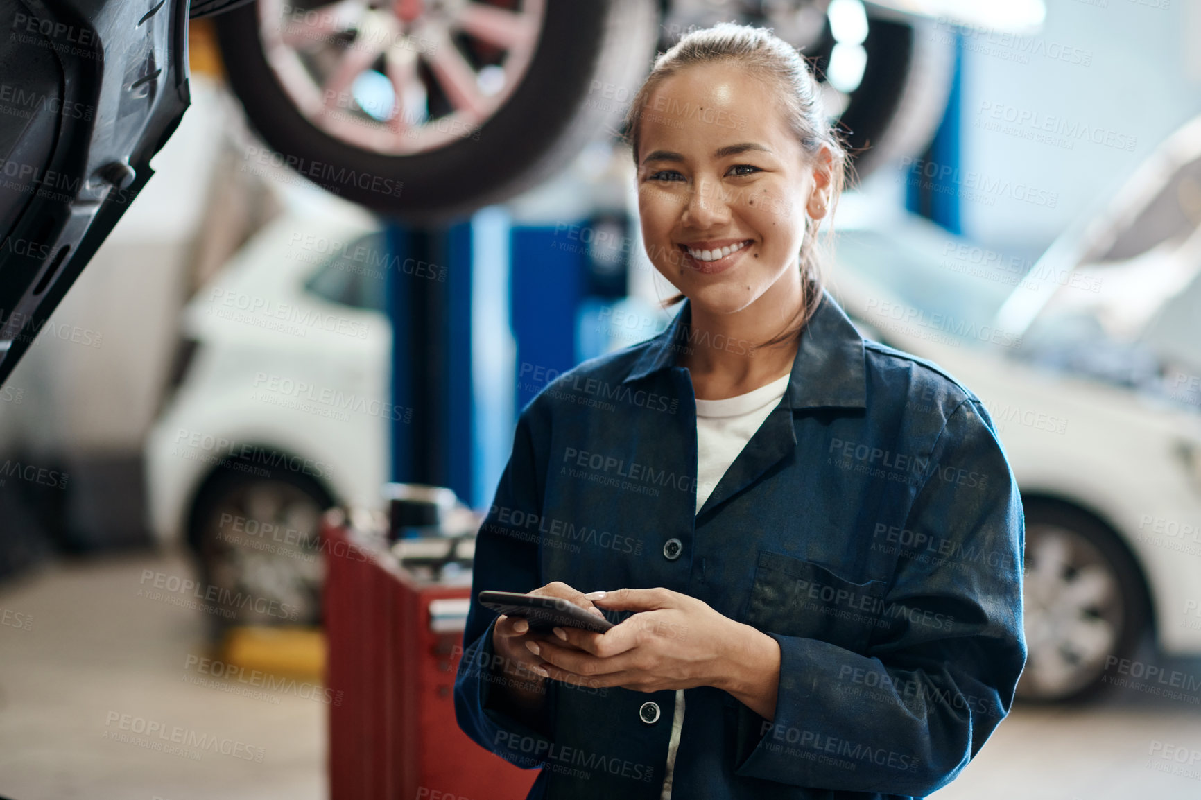 Buy stock photo Portrait, mechanic and woman with smartphone in auto repair shop, smile and internet for online schedule. Face, inspection and person with cellphone in garage and vehicle maintenance with opportunity