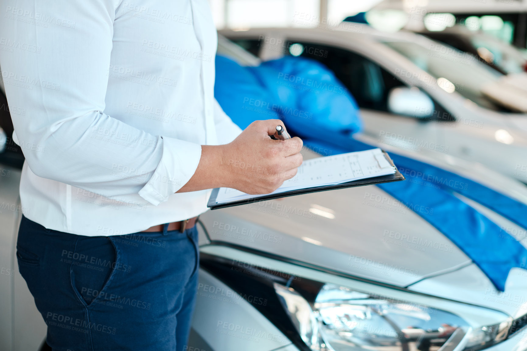 Buy stock photo Car dealership, hands or salesman with paperwork for vehicle, finance checklist or loan documents. Insurance, clipboard or seller in showroom with business, transportation or contract by automobile