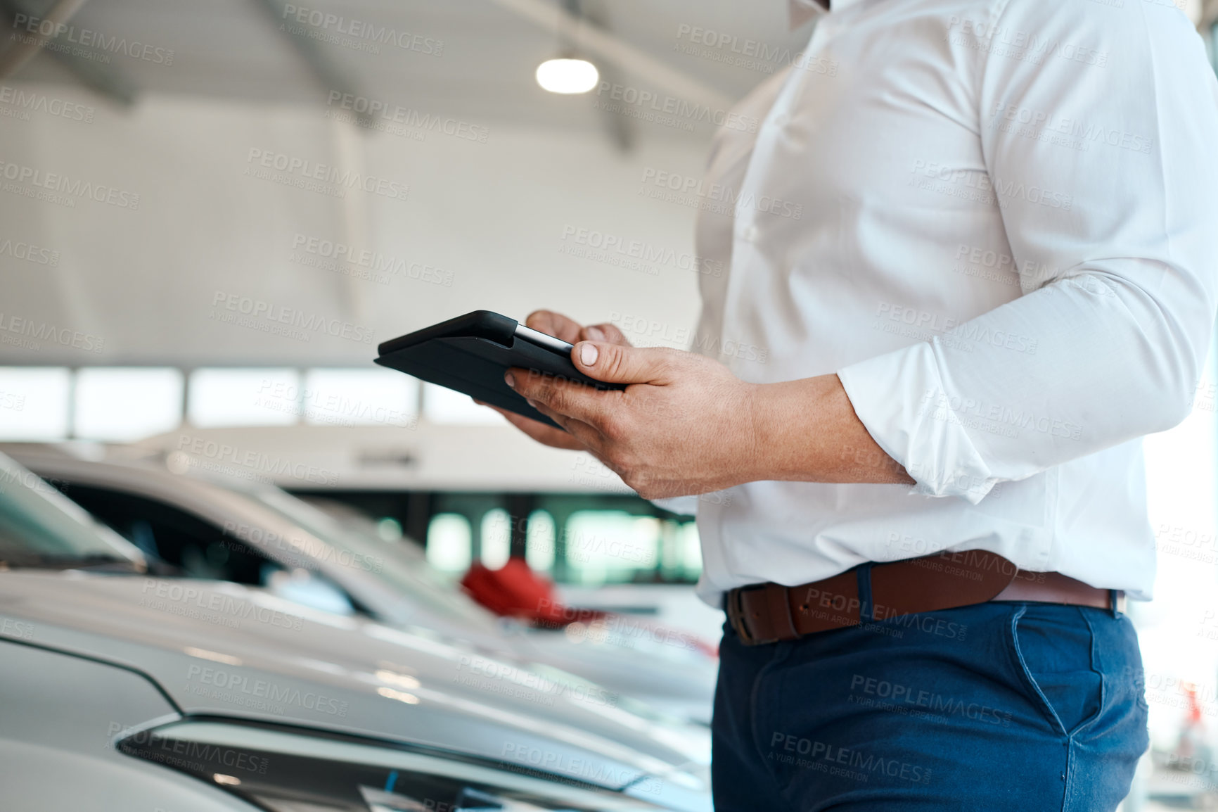 Buy stock photo Car dealership, hands or man with tablet for vehicle, finance or online application for website research. Technology, choice or seller in showroom for business, transportation or automobile features