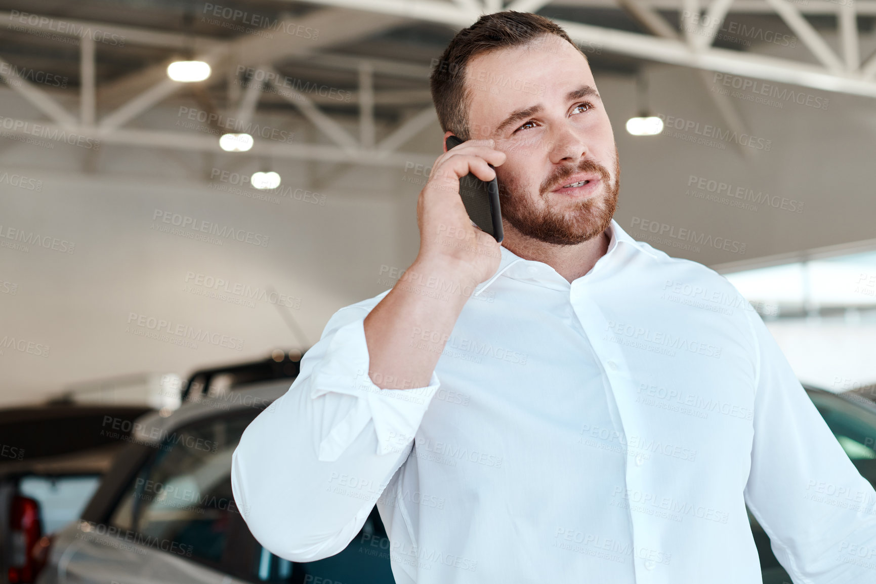 Buy stock photo Phone call, talking or salesman in car dealership for vehicle, finance communication or networking. Trader, agent or seller in showroom speaking for business, transportation or advice by automobile