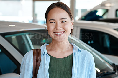 Buy stock photo Shot of a young woman about to purchase a new car