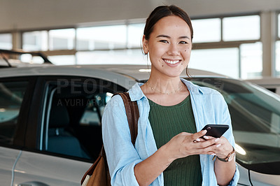 Buy stock photo Shot of a young woman using her smartphone to send text messages