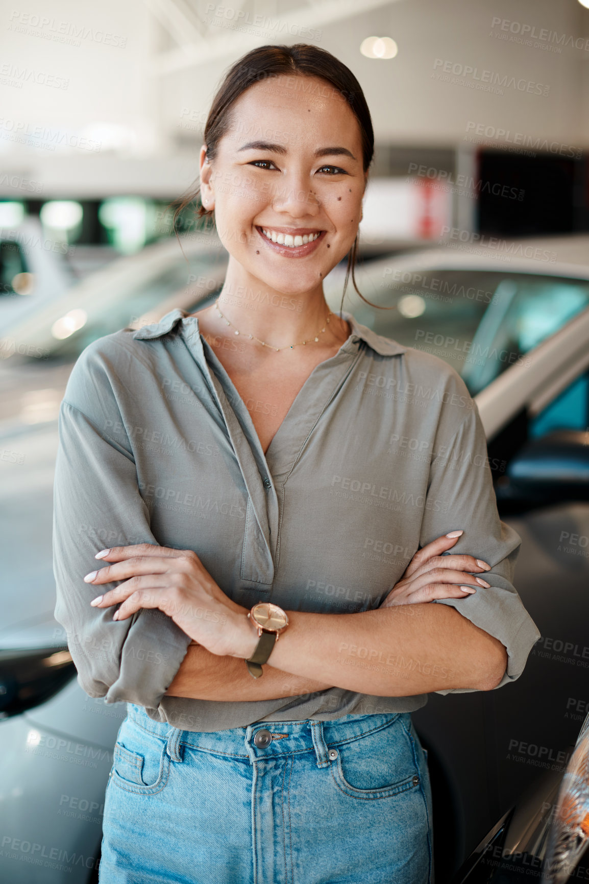 Buy stock photo New car, arms crossed or portrait of happy woman in dealership for purchase, service or loan success. Customer, smile and proud driver in showroom for transportation, automobile shopping or warranty