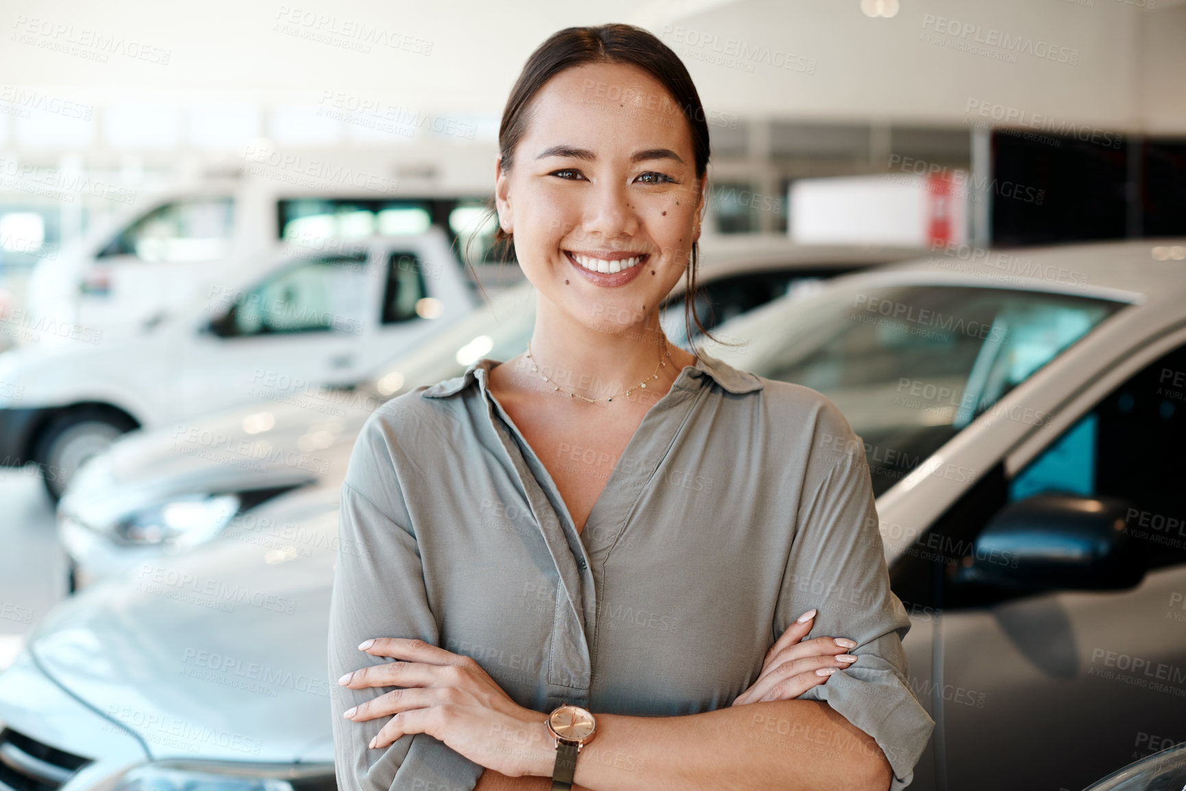 Buy stock photo New car, arms crossed or portrait of happy woman in showroom for purchase, service or loan success. Customer, smile and proud driver in dealership for transportation, automobile shopping or warranty