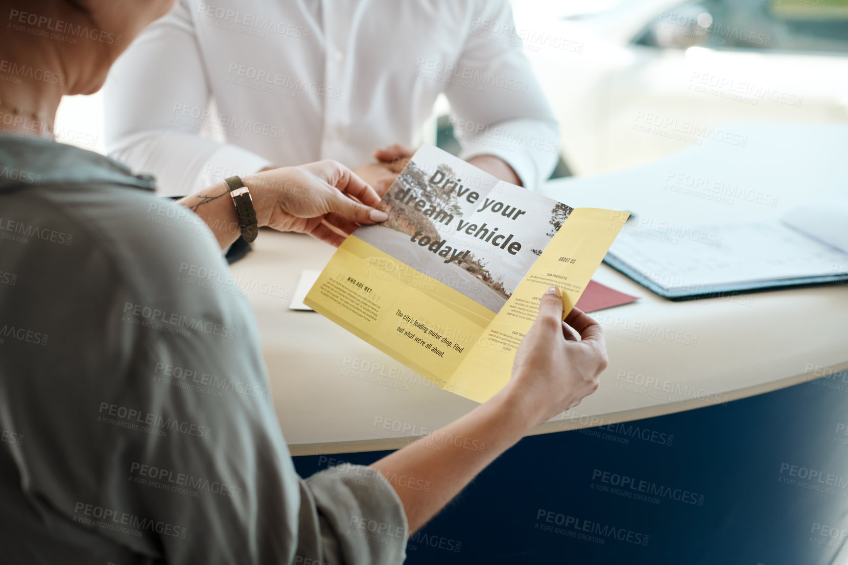 Buy stock photo Car dealership, woman and hands with flyer for motor purchase and brochure for shopping. Showroom, deal and retail sale document at customer consultation meeting with reading an advertisement 