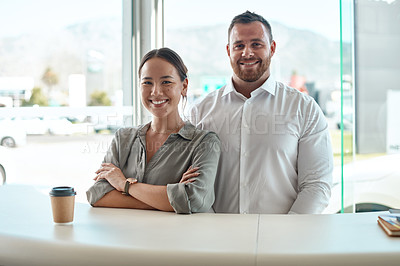 Buy stock photo Shot of a customer with her car salesman in the dealership