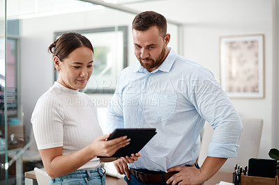 Buy stock photo Tablet, partner and business people reading online for company review, proposal and planning in office. Asian woman with man or boss on digital technology for startup report, ideas and check research